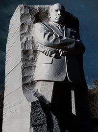 Low angle view of statue against sky