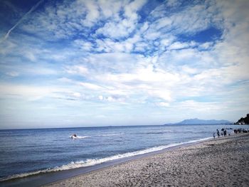 Scenic view of sea against cloudy sky