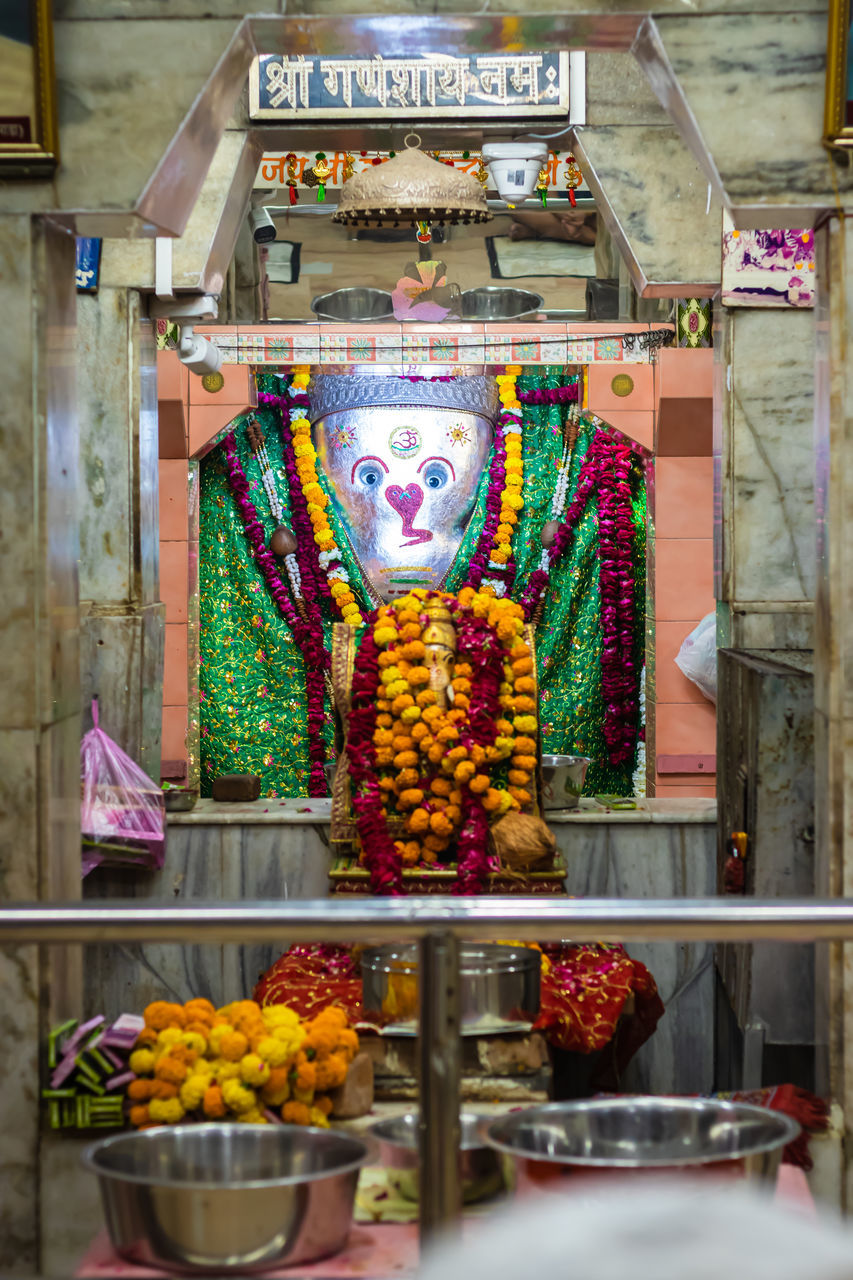 multi colored, architecture, no people, built structure, religion, belief, spirituality, retail, indoors, creativity, market, flower, building, food, human representation, shrine, day