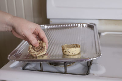 Midsection of person preparing food