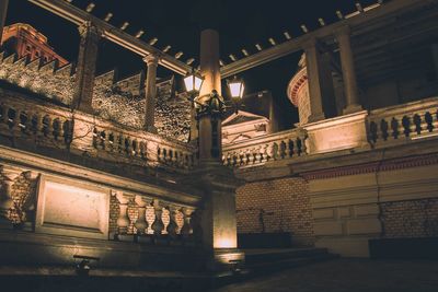 Low angle view of illuminated statue at night