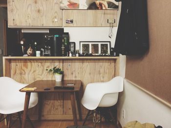Empty chairs and table at home