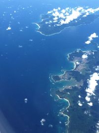 Scenic view of sea against blue sky