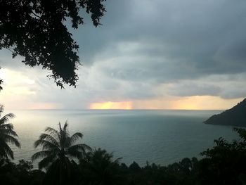 Scenic view of sea against sky at sunset