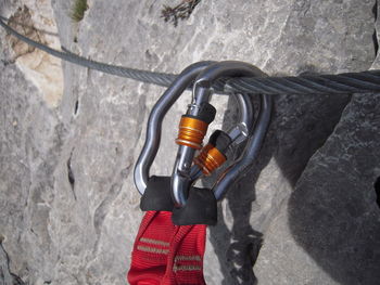 High angle view of man working on metal