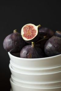 Close-up of fruits against black background