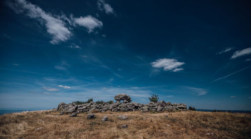 Scenic view of stone circle against sky