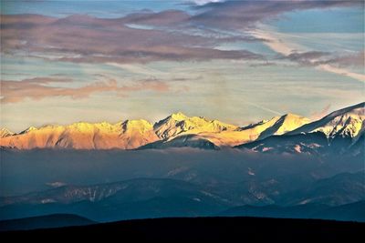 Scenic view of mountains against sky during sunset