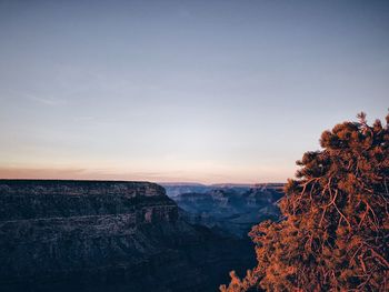 Scenic view of landscape against sky during sunset