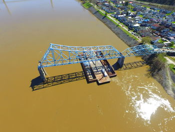 High angle view of metal structure in lake