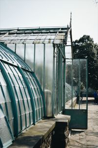 View of greenhouse against clear sky