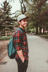 Side view of young man looking away