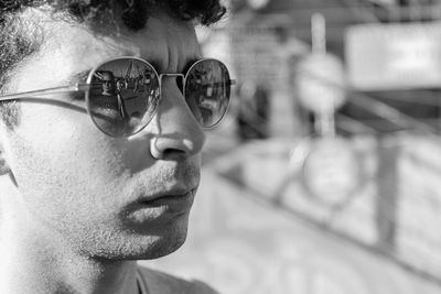 Close-up of young man wearing sunglasses