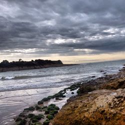 Scenic view of sea against sky at sunset