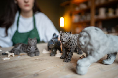Portrait of young woman playing chess
