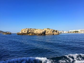 Scenic view of sea against clear sky