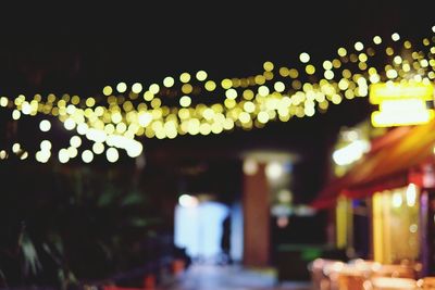 Defocused image of illuminated lights at night