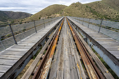 High angle view of railroad bridge over mountain