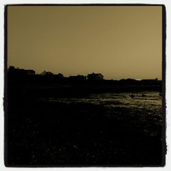 Scenic view of sea at sunset