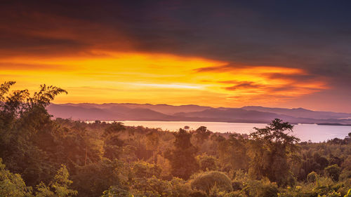 Scenic view of landscape against sky during sunset