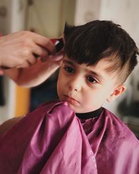 Close-up portrait of boy at home