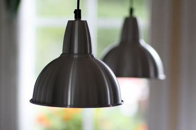 Close-up of pendant lights at home