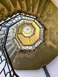 Low angle view of spiral staircase in building