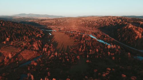 Scenic view of landscape against sky during sunset