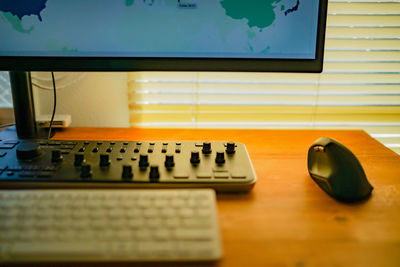 High angle view of computer keyboard on table