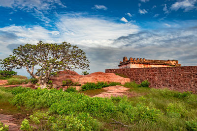 View of castle against cloudy sky