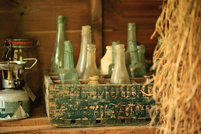 Old bottles in a wooden box