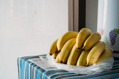 Close-up of banana in plate on table at home