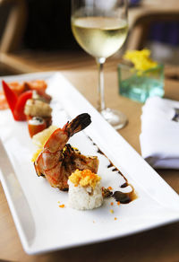 Close-up of served food in plate on table