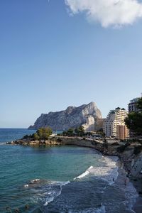 View of beach against blue sky