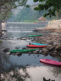 Boats moored on shore