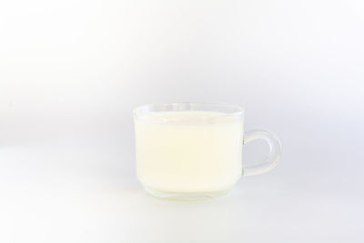 Close-up of drink against white background