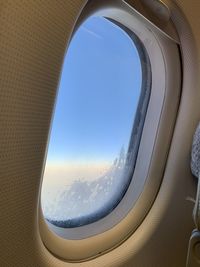 Scenic view of sky seen through airplane window