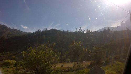 Panoramic view of landscape against cloudy sky