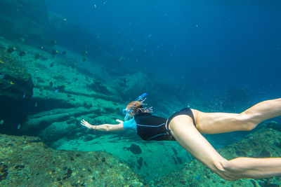 Woman swimming in sea