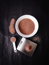 High angle view of chocolate powder on table