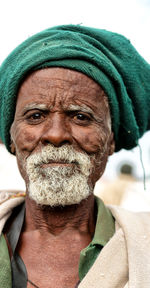 Portrait of man wearing hat