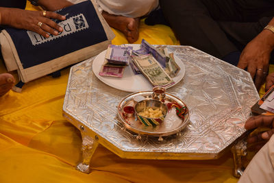 High angle view of man preparing food on table