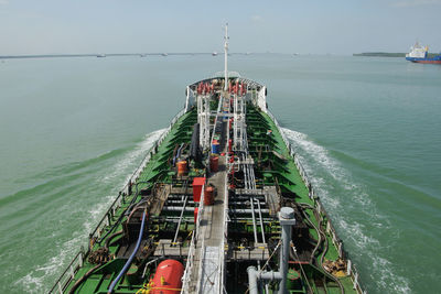 High angle view of ship sailing in sea against sky