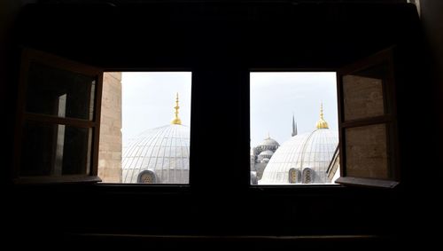 Buildings seen through window