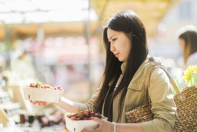 Young asia woman shopping at the market