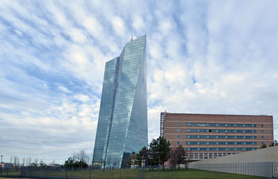 Modern skyscrapers against sky