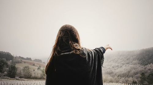 Woman standing on landscape