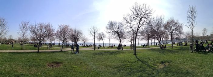 Group of people on field in park