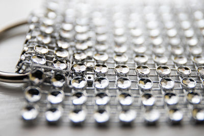 High angle view of metallic decoration on table