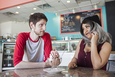 Young couple at a diner.